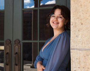 Headshot of Chloe Shomo outside Bascom Hall.
